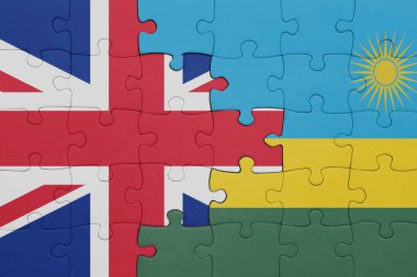 Ruanda 'nın renkli ulusal bayrağı ve Büyük Britanya bayrağı ile bulmaca. konsept