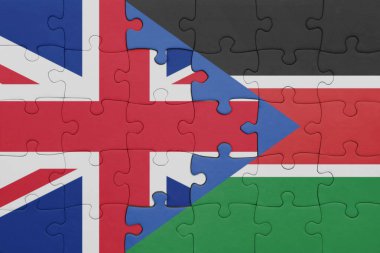 Güney Sudan 'ın renkli ulusal bayrağı ve Büyük Britanya bayrağı ile bulmaca. konsept