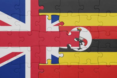 Uganda 'nın renkli ulusal bayrağı ve Büyük Britanya bayrağı ile bulmaca. konsept