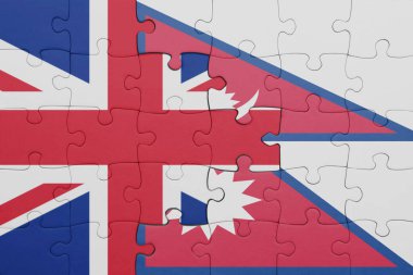 Nepal 'in renkli ulusal bayrağı ve Büyük Britanya bayrağı ile bulmaca. konsept