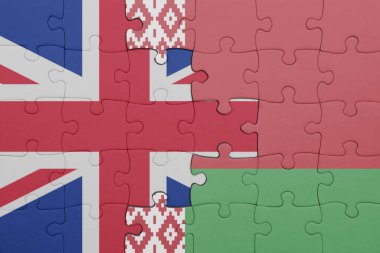 Beyaz Rusya 'nın renkli ulusal bayrağı ve Büyük Britanya bayrağı ile bulmaca. konsept