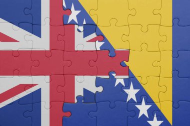 Bosna ve Herzegovina 'nın renkli ulusal bayrağı ve Büyük Britanya bayrağı. konsept