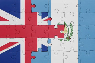 Guatemala 'nın renkli ulusal bayrağı ve Büyük Britanya bayrağı. konsept