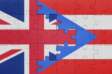 Porto Riko 'nun renkli ulusal bayrağı ve Büyük Britanya bayrağı ile bulmaca. konsept