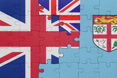 Fiji 'nin renkli ulusal bayrağı ve Büyük Britanya bayrağı ile bulmaca. konsept