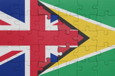 Guyana 'nın renkli ulusal bayrağı ve Büyük Britanya bayrağı. konsept