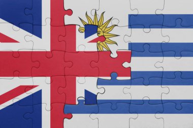 Uruguay 'ın renkli ulusal bayrağı ve İngiltere bayrağı ile bulmaca. konsept