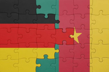 Kamerun ve Alman bayrağının renkli ulusal bayrağıyla bulmaca. konsept