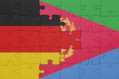 Eritrea 'nın renkli ulusal bayrağı ve Almanya bayrağıyla ilgili bulmacalar. konsept