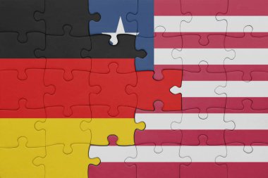 Liberya 'nın renkli ulusal bayrağı ve Almanya bayrağı. konsept