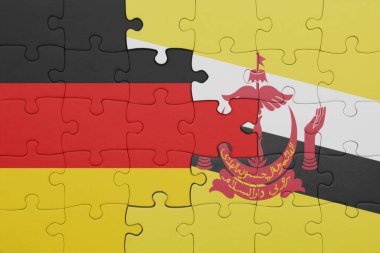 Esmer bayrağı ve Alman bayrağının rengarenk ulusal bayrağıyla bulmaca. konsept