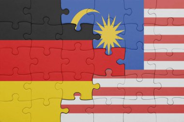 Malezya 'nın renkli ulusal bayrağı ve Almanya bayrağıyla ilgili bulmacalar. konsept