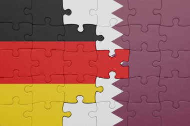 Katar 'ın renkli ulusal bayrağı ve Almanya bayrağıyla ilgili bulmacalar. konsept