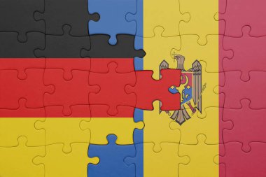 Moldova 'nın renkli ulusal bayrağı ve Almanya bayrağının bulmacası. konsept