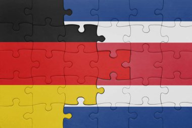 Kosta Rika 'nın renkli ulusal bayrağı ve Almanya bayrağıyla ilgili bulmacalar. konsept