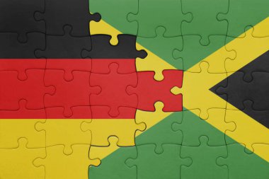 Jamaika 'nın renkli ulusal bayrağı ve Almanya bayrağıyla ilgili bulmacalar. konsept