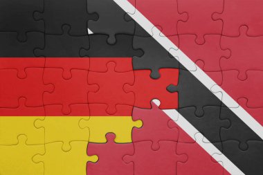 Trinidad, Tobago ve Almanya bayrağının renkli ulusal bayrağıyla bulmaca. konsept
