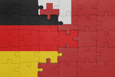 Tonga 'nın renkli ulusal bayrağı ve Almanya bayrağı ile bulmaca. konsept