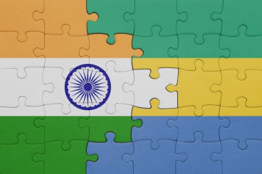 Hint bayrağı ve Gabon 'un renkli ulusal bayrağıyla bulmaca. konsept