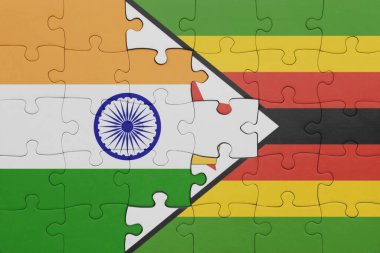 Zimbabwe 'nin renkli ulusal bayrağı ve Hindistan bayrağı ile bulmaca. konsept