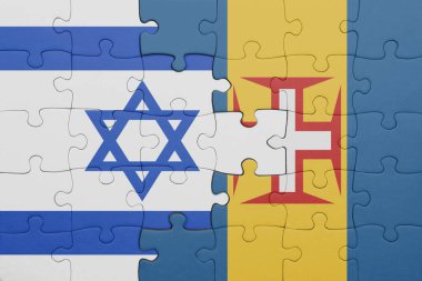 Renkli ulusal madeira bayrağı ve İsrail bayrağı ile bulmaca. konsept