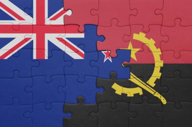Angola 'nın renkli ulusal bayrağı ve Yeni Zelanda bayrağı. konsept