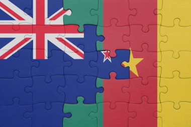 Kamerun ve Yeni Zelanda bayrağının renkli ulusal bayrağıyla bulmaca. konsept
