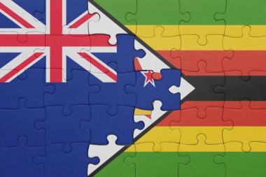 Zimbabwe 'nin renkli ulusal bayrağı ve Yeni Zelanda bayrağı. konsept