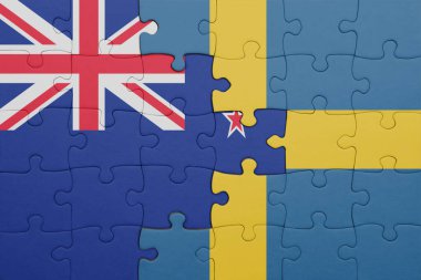 İsveç ve Yeni Zelanda bayrağının renkli ulusal bayrağıyla bulmaca. konsept