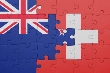 İsviçre 'nin renkli ulusal bayrağı ve Yeni Zelanda bayrağı. konsept