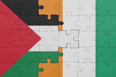 Cote divoire ve Filistin bayrağının renkli ulusal bayrağıyla bulmaca. konsept