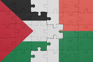 Macadagaskar 'ın renkli ulusal bayrağı ve Filistin bayrağıyla ilgili bulmacalar. konsept