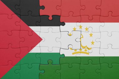 Tacikistan 'ın renkli ulusal bayrağı ve Filistin bayrağının bulmacası. konsept