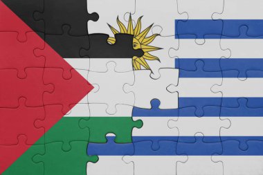 Uruguay 'ın renkli ulusal bayrağı ve Filistin bayrağının bulmacası. konsept