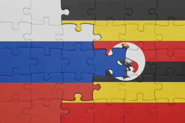 Uganda 'nın renkli ulusal bayrağı ve Rusya bayrağı. konsept
