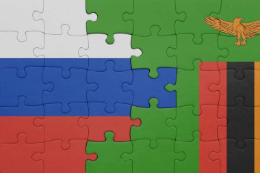 Zambiya 'nın renkli ulusal bayrağı ve Rusya bayrağı ile bulmaca. konsept