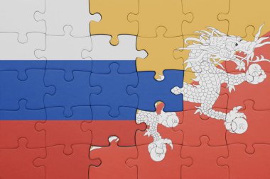 Bhutan ve Rusya bayrağının renkli ulusal bayrağıyla bulmaca. konsept