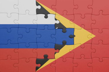 Doğu Timor 'un renkli ulusal bayrağı ve Rusya bayrağının bulmacası. konsept