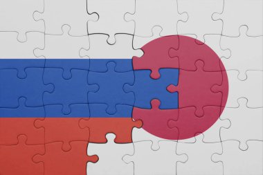 Japonya 'nın renkli ulusal bayrağı ve Rusya bayrağıyla ilgili bulmacalar. konsept