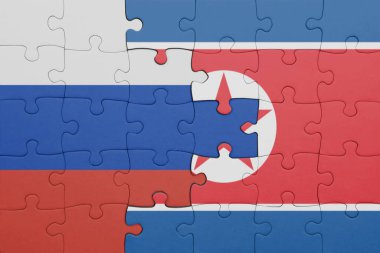 Kuzey Kore 'nin renkli ulusal bayrağı ve Rusya bayrağıyla ilgili bulmacalar. konsept
