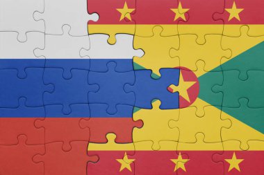 Grenada bayrağı ve Rusya bayrağının rengarenk yapbozu. konsept