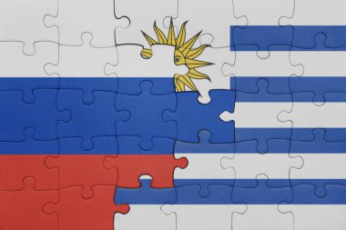 Uruguay 'ın renkli ulusal bayrağı ve Rusya bayrağıyla ilgili bulmacalar. konsept