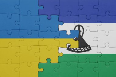 Lesotho ve Ukrayna bayrağının renkli ulusal bayrağıyla bulmaca. konsept