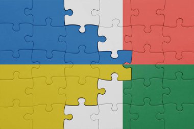Macagara 'nın renkli ulusal bayrağı ve Ukrayna bayrağıyla bulmaca. konsept