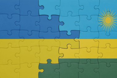Ruanda 'nın renkli ulusal bayrağı ve Ukrayna bayrağıyla bir bulmaca. konsept