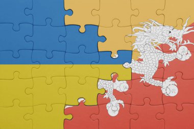 Bhutan 'ın renkli ulusal bayrağı ve Ukrayna bayrağı ile bulmaca. konsept