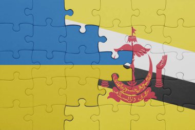 Ukrayna bayrağı ve brunei 'nin renkli ulusal bayrağıyla bulmaca. konsept