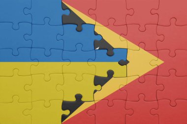 Doğu Timor 'un renkli ulusal bayrağı ve Ukrayna bayrağı. konsept