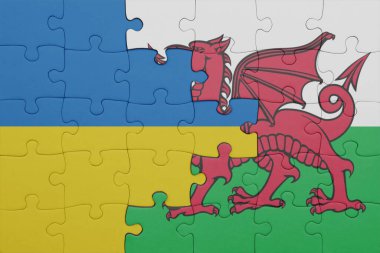 Galler 'in renkli ulusal bayrağı ve Ukrayna bayrağı ile bulmaca. konsept