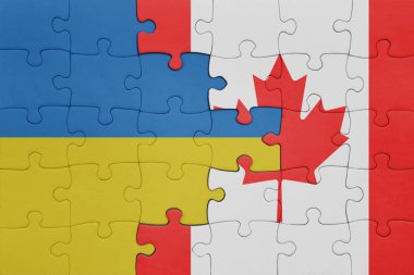 Kanada 'nın renkli ulusal bayrağı ve Ukrayna bayrağı. konsept